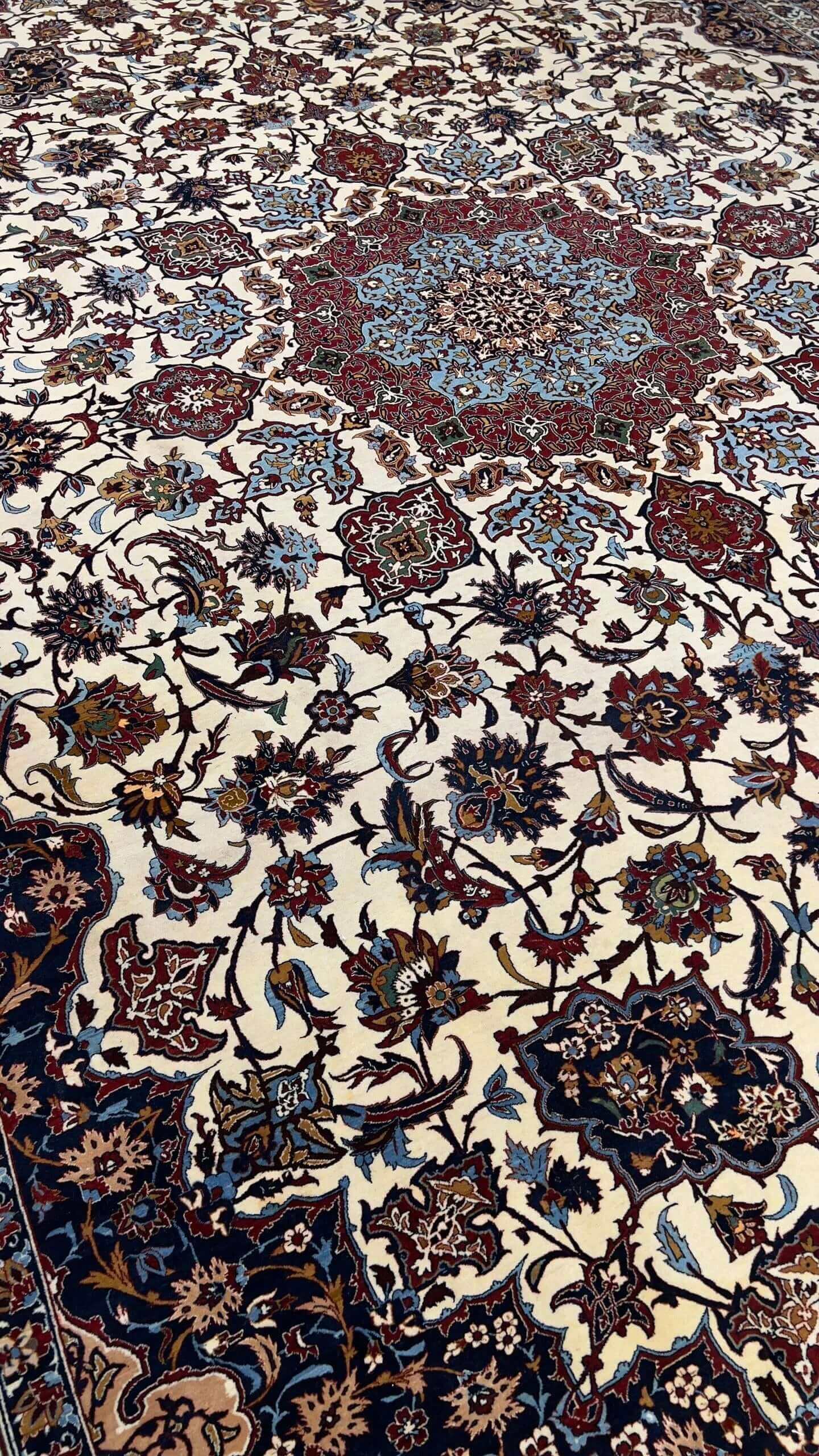 "Luxurious Seirafian Persian carpet made with silk warp and wool-silk pile, measuring 13x9.8 feet."